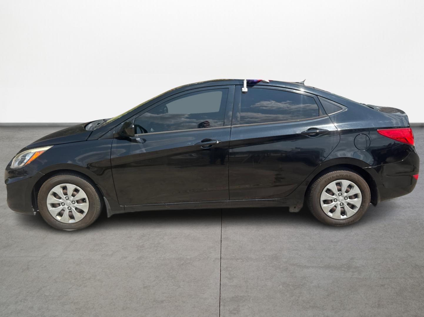 2016 Black /Gray Hyundai Accent SE 4-Door 6A (KMHCT4AE9GU) with an 1.6L L4 DOHC 16V engine, 6A transmission, located at 16710 Clay Rd., Houston, TX, 77084, (281) 859-7900, 29.834864, -95.656166 - Photo#7