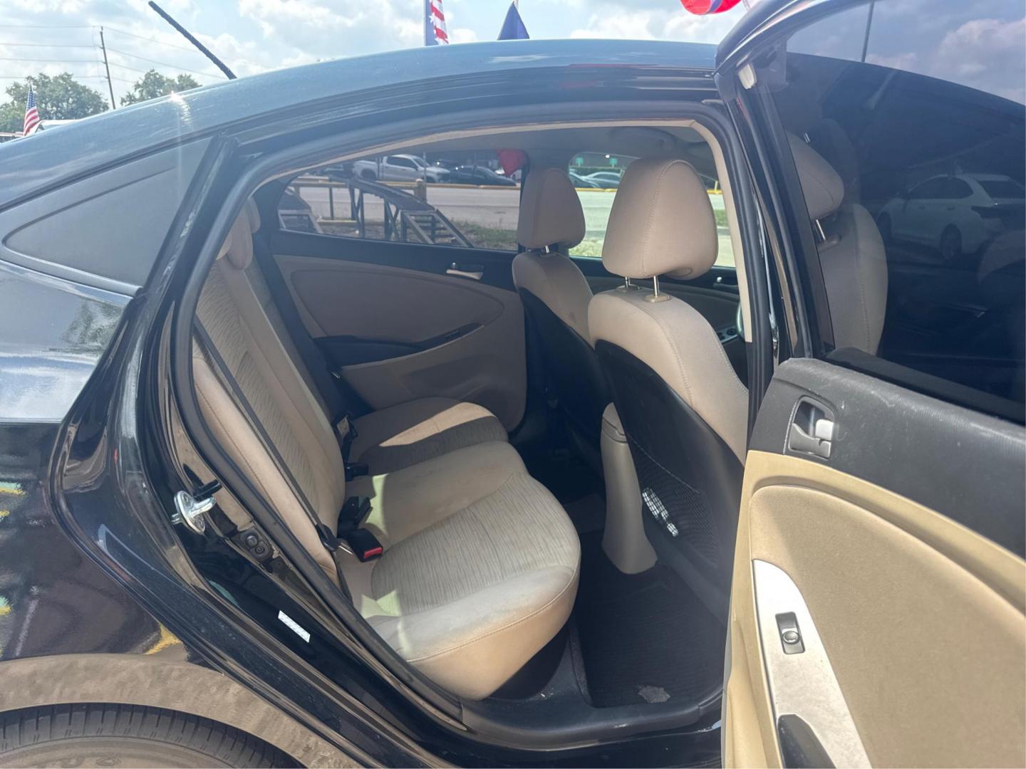 2016 Black /Gray Hyundai Accent SE 4-Door 6A (KMHCT4AE9GU) with an 1.6L L4 DOHC 16V engine, 6A transmission, located at 16710 Clay Rd., Houston, TX, 77084, (281) 859-7900, 29.834864, -95.656166 - Photo#10
