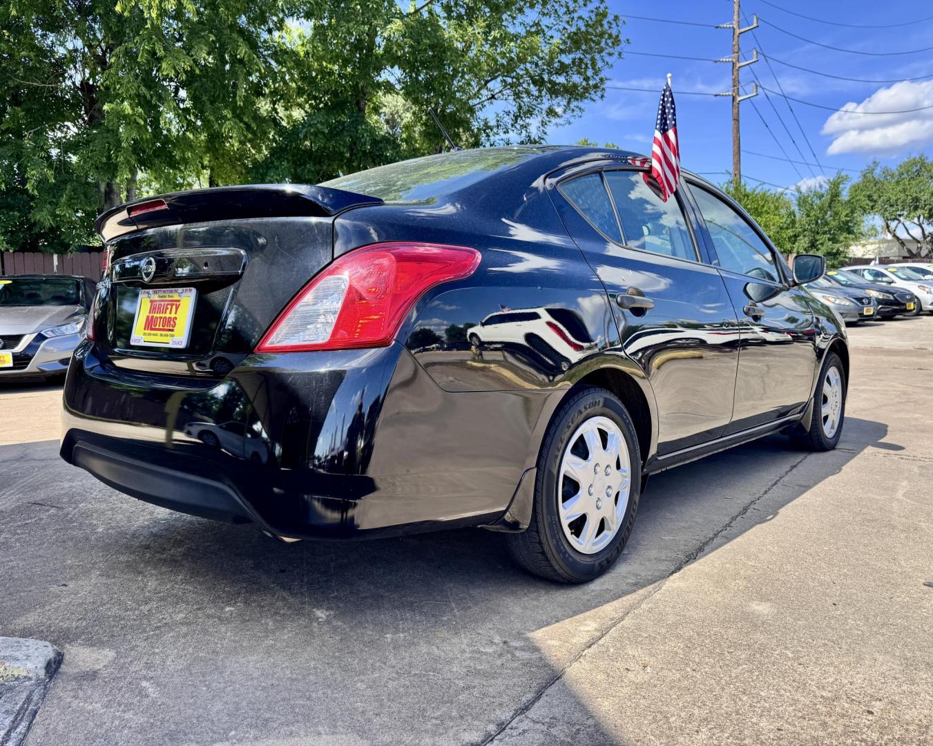 2019 Black /Black Nissan Versa 1.6 SV Sedan (3N1CN7AP5KL) with an 1.6L L4 DOHC 16V engine, CVT transmission, located at 16710 Clay Rd., Houston, TX, 77084, (281) 859-7900, 29.834864, -95.656166 - Photo#2