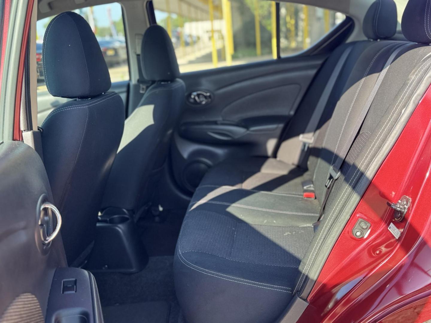 2019 Black /Black Nissan Versa 1.6 SV Sedan (3N1CN7AP5KL) with an 1.6L L4 DOHC 16V engine, CVT transmission, located at 16710 Clay Rd., Houston, TX, 77084, (281) 859-7900, 29.834864, -95.656166 - Photo#9