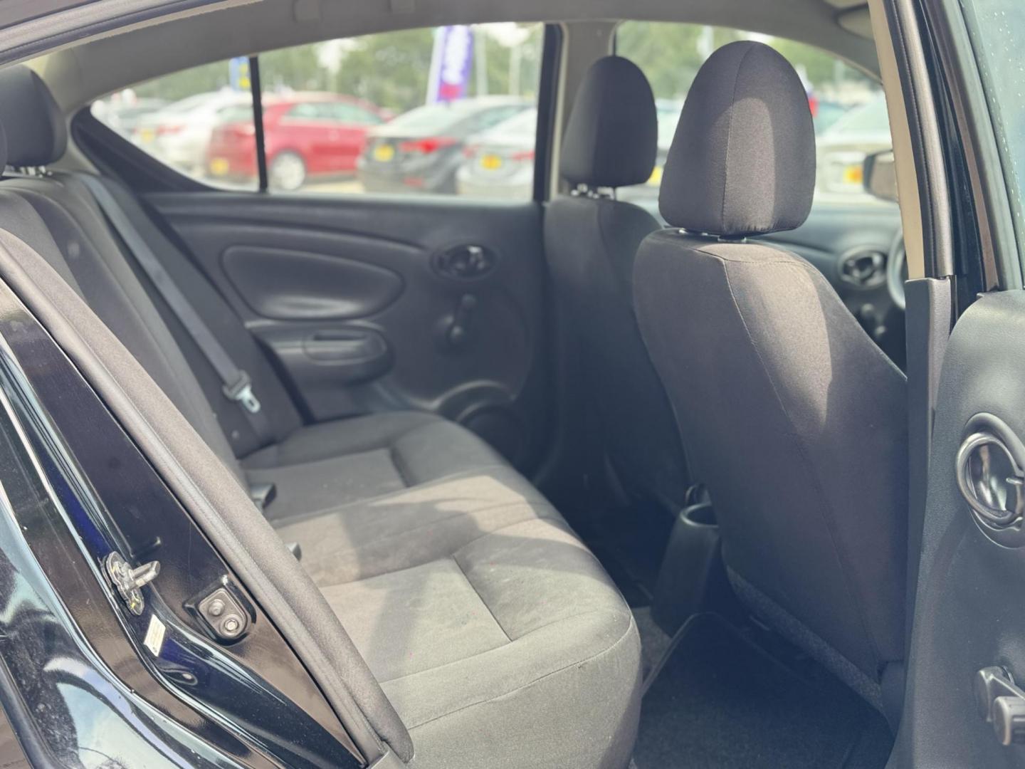 2019 Black /Black Nissan Versa 1.6 SV Sedan (3N1CN7AP5KL) with an 1.6L L4 DOHC 16V engine, CVT transmission, located at 16710 Clay Rd., Houston, TX, 77084, (281) 859-7900, 29.834864, -95.656166 - Photo#11