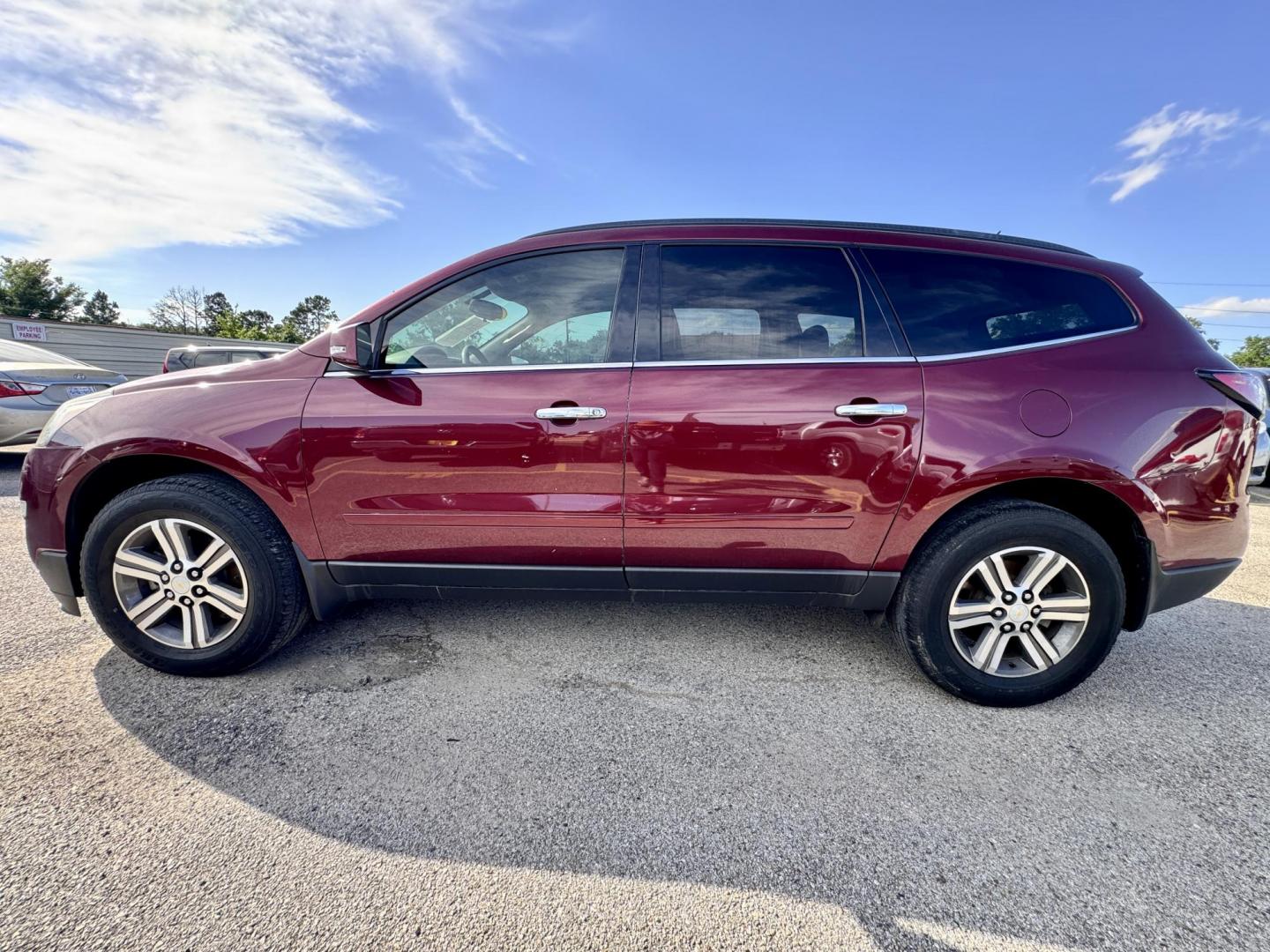 2017 Red /Gray Chevrolet Traverse 1LT FWD (1GNKRGKD7HJ) with an 3.6L V6 DOHC 24V engine, 6A transmission, located at 16710 Clay Rd., Houston, TX, 77084, (281) 859-7900, 29.834864, -95.656166 - Photo#4