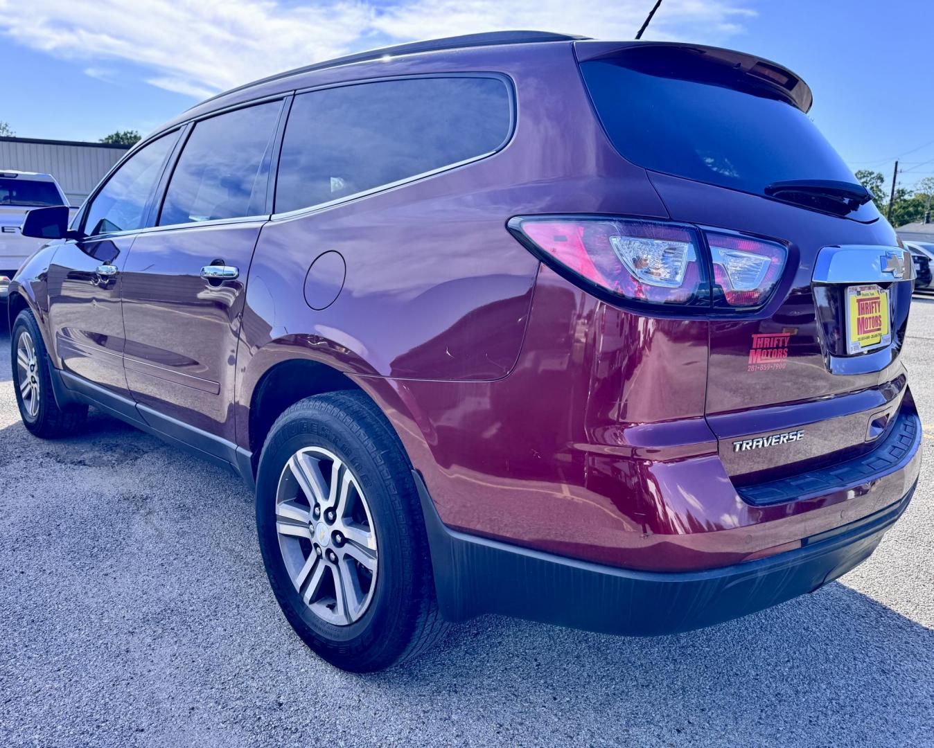 2017 Red /Gray Chevrolet Traverse 1LT FWD (1GNKRGKD7HJ) with an 3.6L V6 DOHC 24V engine, 6A transmission, located at 16710 Clay Rd., Houston, TX, 77084, (281) 859-7900, 29.834864, -95.656166 - Photo#3