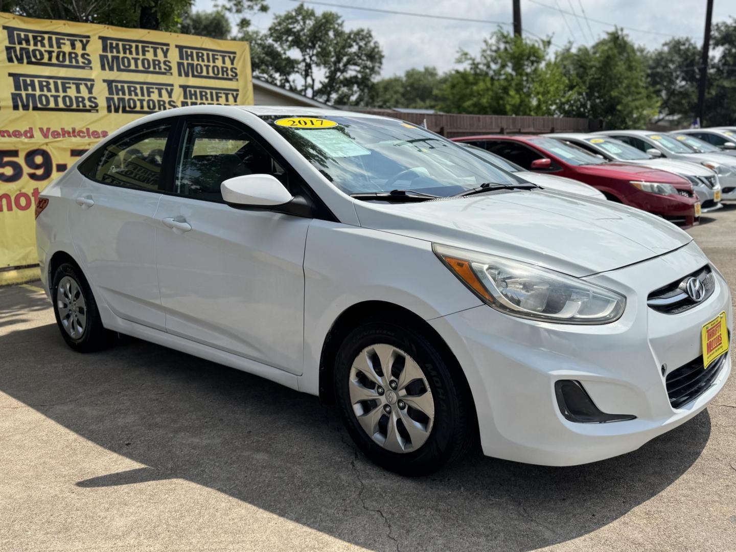 2017 White /Gray Hyundai Accent SE 4-Door 6M (KMHCT4AE7HU) with an 1.6L L4 DOHC 16V engine, 6M transmission, located at 16710 Clay Rd., Houston, TX, 77084, (281) 859-7900, 29.834864, -95.656166 - Photo#2