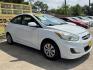 2017 White /Gray Hyundai Accent SE 4-Door 6M (KMHCT4AE7HU) with an 1.6L L4 DOHC 16V engine, 6M transmission, located at 16710 Clay Rd., Houston, TX, 77084, (281) 859-7900, 29.834864, -95.656166 - Photo#2