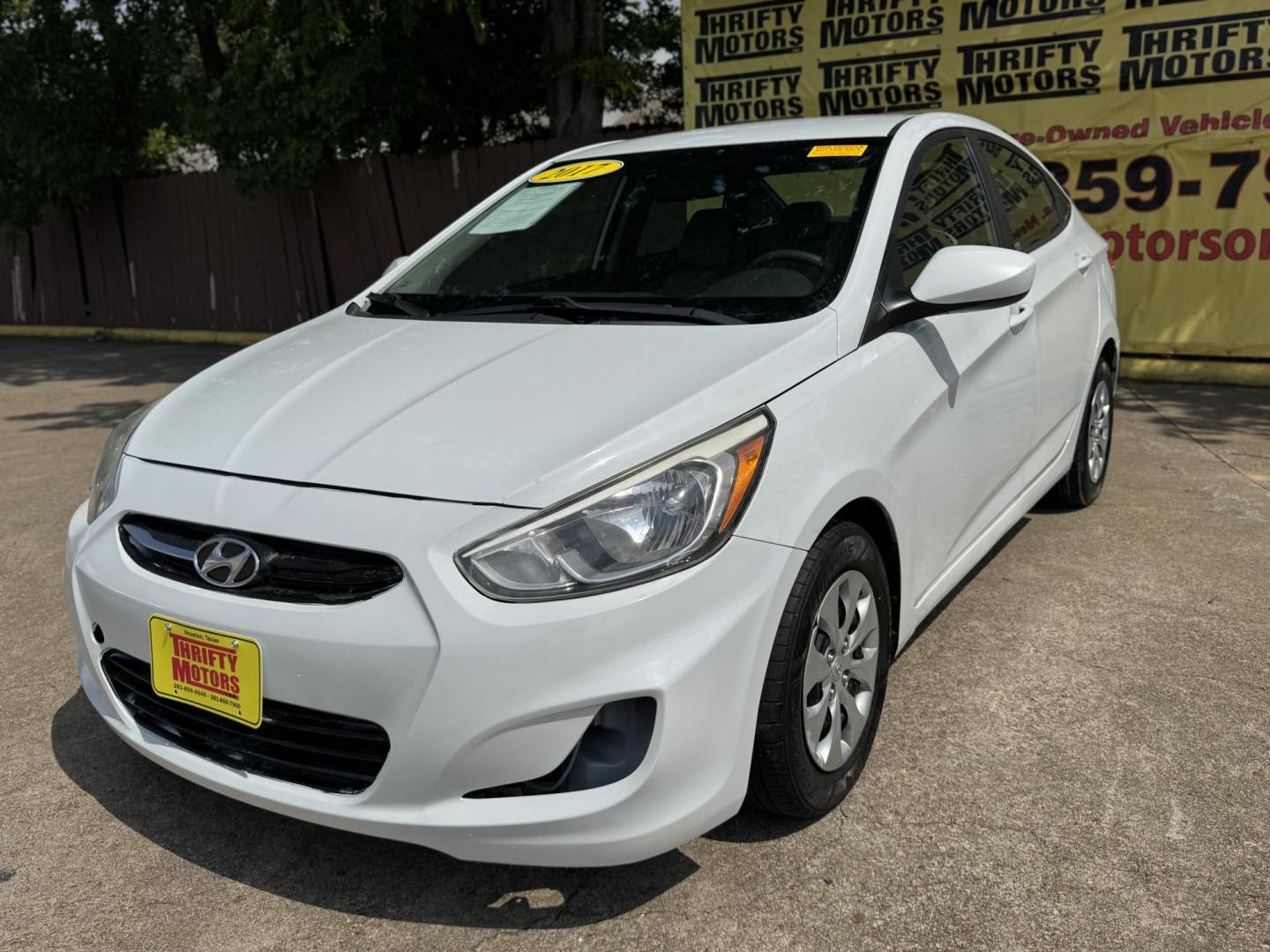 2017 White /Gray Hyundai Accent SE 4-Door 6M (KMHCT4AE7HU) with an 1.6L L4 DOHC 16V engine, 6M transmission, located at 16710 Clay Rd., Houston, TX, 77084, (281) 859-7900, 29.834864, -95.656166 - Photo#1