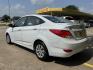 2017 White /Gray Hyundai Accent SE 4-Door 6M (KMHCT4AE7HU) with an 1.6L L4 DOHC 16V engine, 6M transmission, located at 16710 Clay Rd., Houston, TX, 77084, (281) 859-7900, 29.834864, -95.656166 - Photo#6