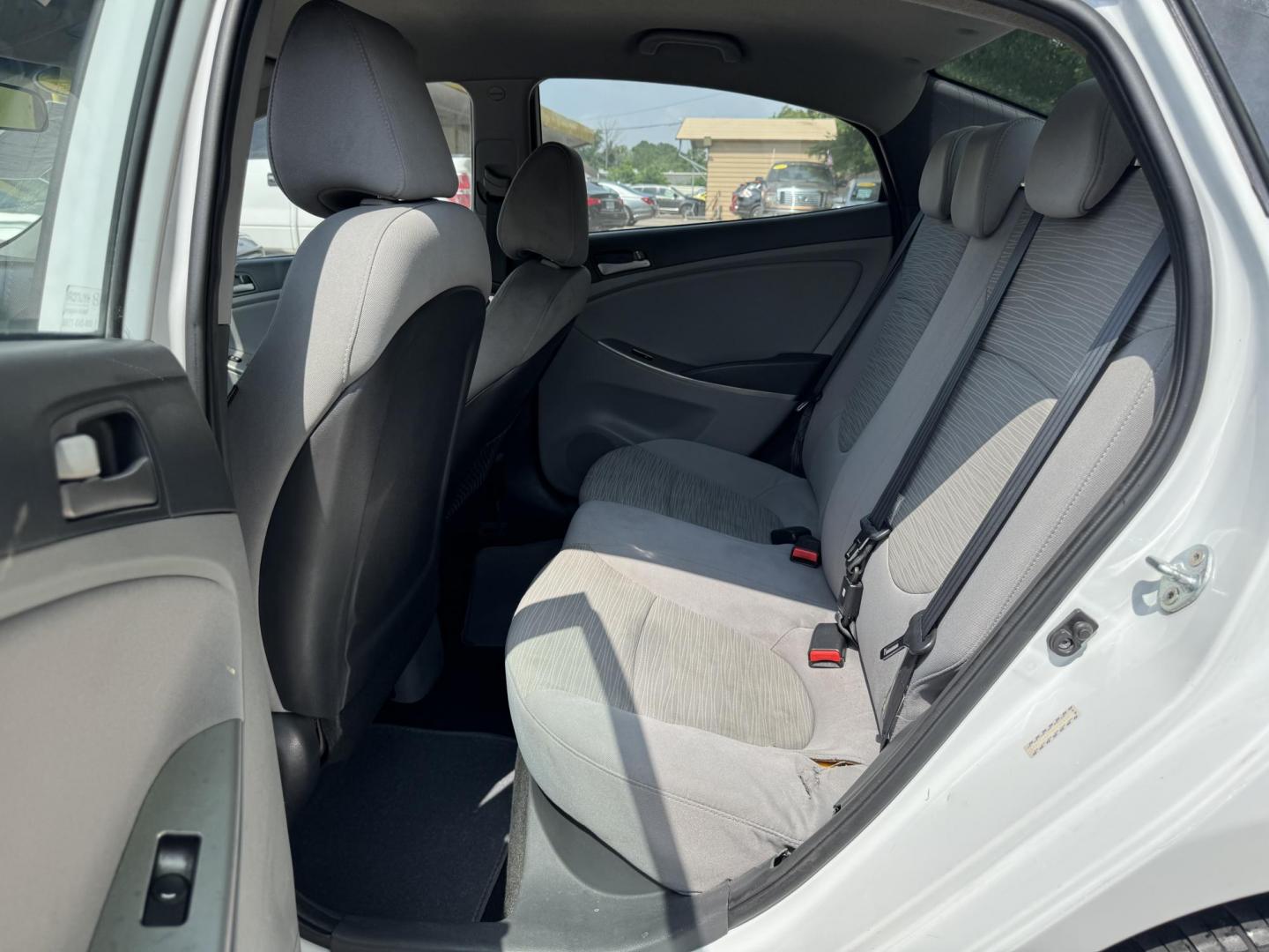 2017 White /Gray Hyundai Accent SE 4-Door 6M (KMHCT4AE7HU) with an 1.6L L4 DOHC 16V engine, 6M transmission, located at 16710 Clay Rd., Houston, TX, 77084, (281) 859-7900, 29.834864, -95.656166 - Photo#10