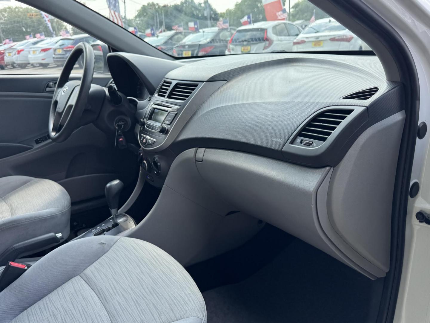 2017 White /Gray Hyundai Accent SE 4-Door 6M (KMHCT4AE7HU) with an 1.6L L4 DOHC 16V engine, 6M transmission, located at 16710 Clay Rd., Houston, TX, 77084, (281) 859-7900, 29.834864, -95.656166 - Photo#15
