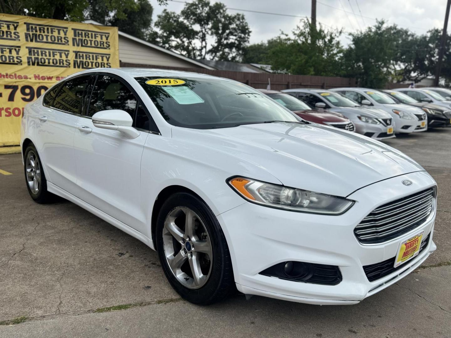 2015 White /Black Ford Fusion SE (1FA6P0HD8F5) with an 1.5L L4 DOHC 16V engine, located at 16710 Clay Rd., Houston, TX, 77084, (281) 859-7900, 29.834864, -95.656166 - Photo#2