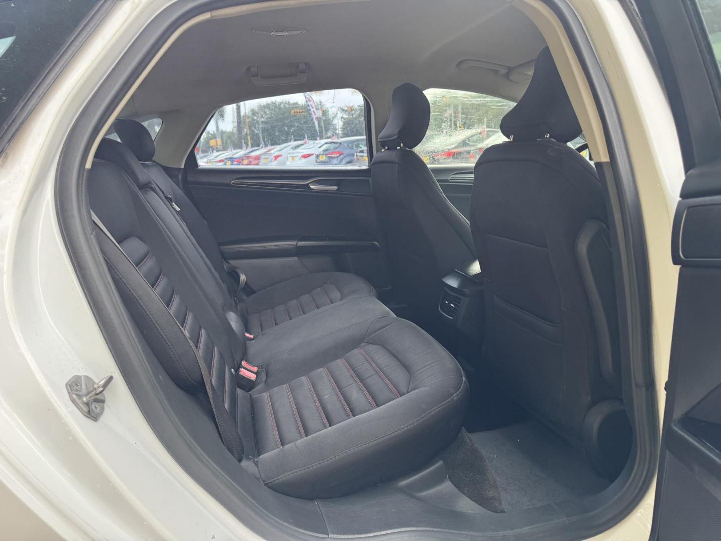 2015 White /Black Ford Fusion SE (1FA6P0HD8F5) with an 1.5L L4 DOHC 16V engine, located at 16710 Clay Rd., Houston, TX, 77084, (281) 859-7900, 29.834864, -95.656166 - Photo#11