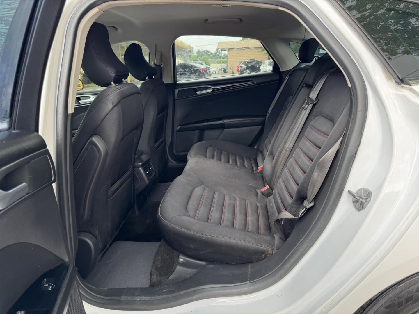 2015 White /Black Ford Fusion SE (1FA6P0HD8F5) with an 1.5L L4 DOHC 16V engine, located at 16710 Clay Rd., Houston, TX, 77084, (281) 859-7900, 29.834864, -95.656166 - Photo#13