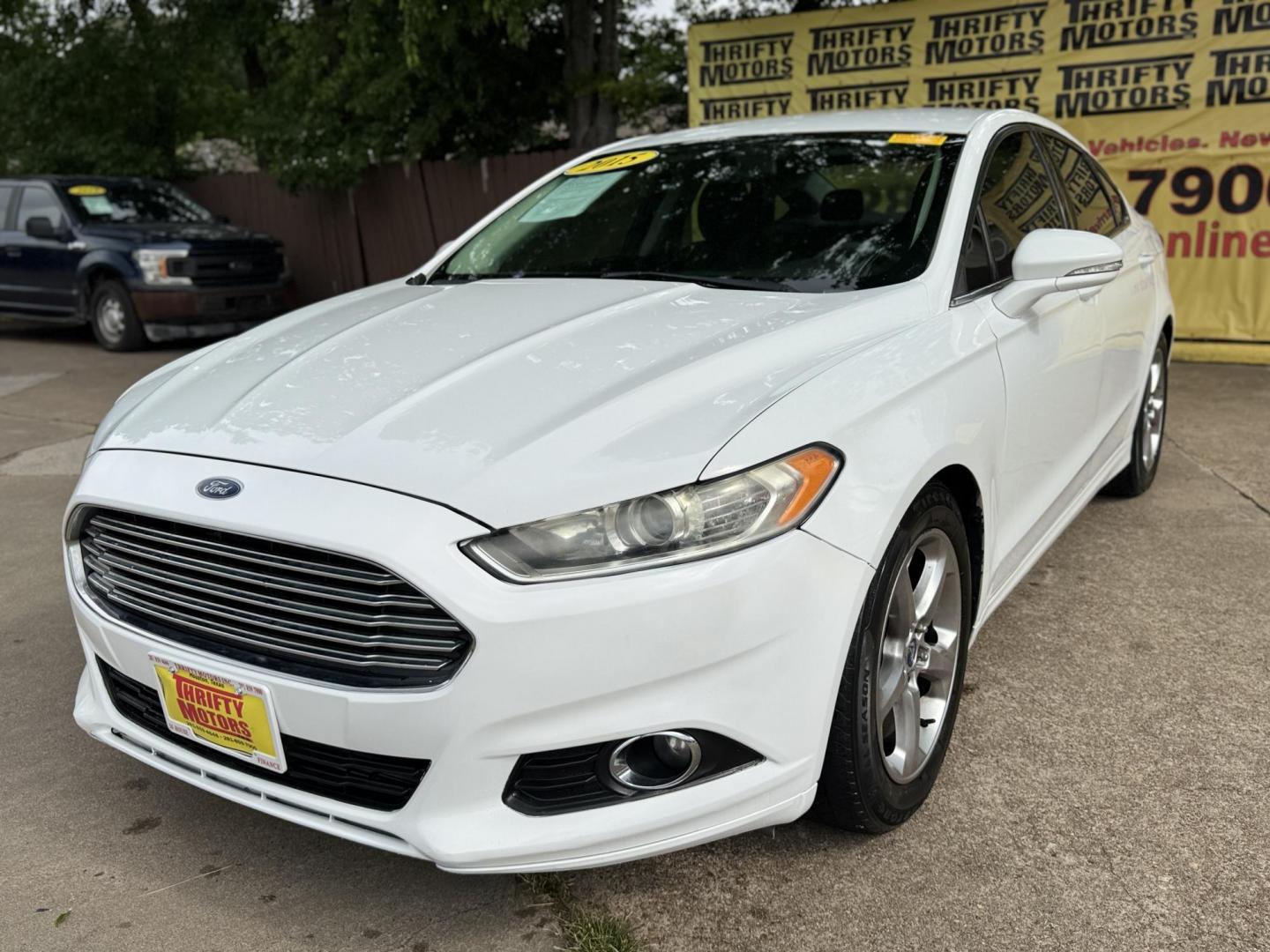 2015 White /Black Ford Fusion SE (1FA6P0HD8F5) with an 1.5L L4 DOHC 16V engine, located at 16710 Clay Rd., Houston, TX, 77084, (281) 859-7900, 29.834864, -95.656166 - Photo#19
