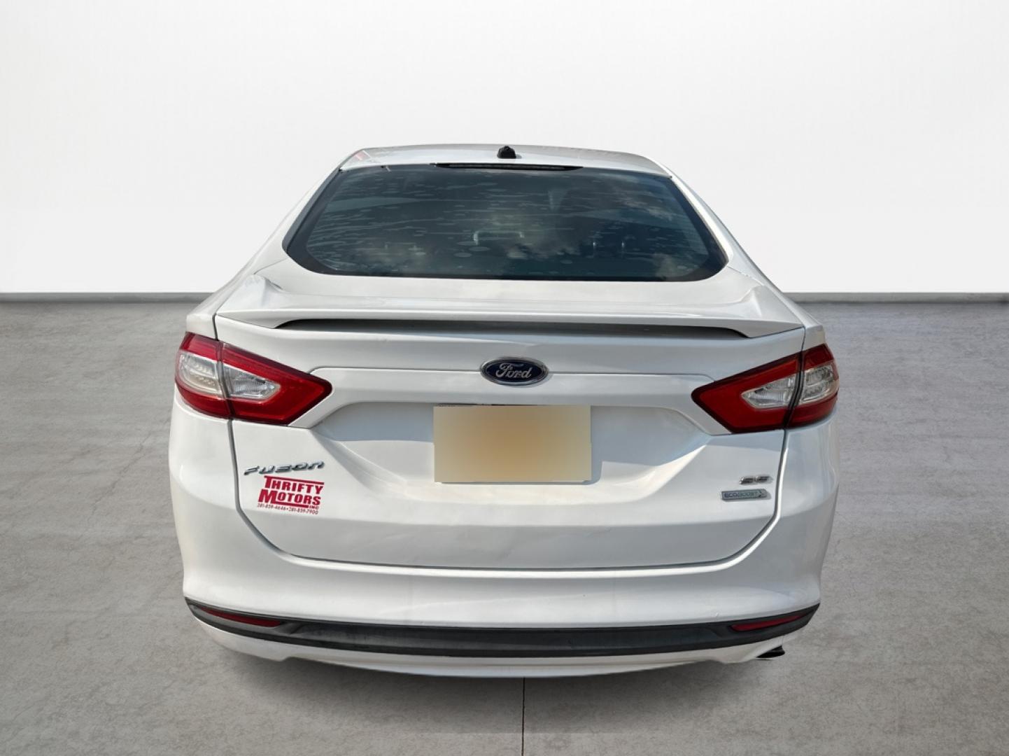 2015 White /Black Ford Fusion SE (1FA6P0HD8F5) with an 1.5L L4 DOHC 16V engine, located at 16710 Clay Rd., Houston, TX, 77084, (281) 859-7900, 29.834864, -95.656166 - Photo#5