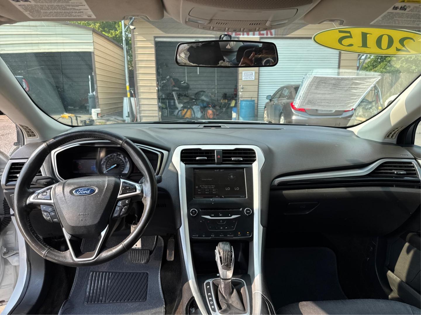 2015 White /Black Ford Fusion SE (1FA6P0HD8F5) with an 1.5L L4 DOHC 16V engine, located at 16710 Clay Rd., Houston, TX, 77084, (281) 859-7900, 29.834864, -95.656166 - Photo#9