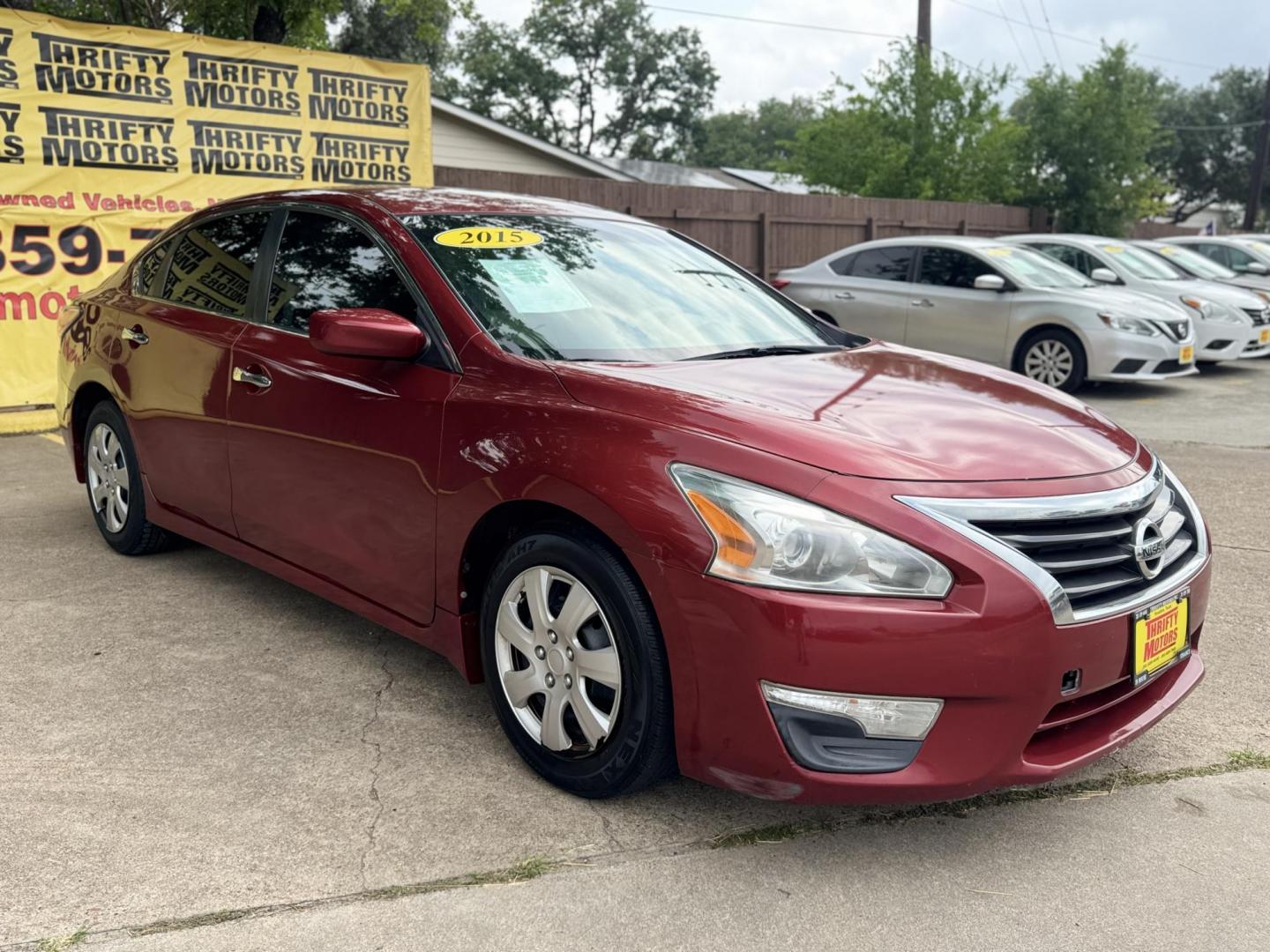 2015 Red /Tan Nissan Altima 2.5 S (1N4AL3AP4FN) with an 2.5L L4 DOHC 16V engine, Continuously Variable Transmission transmission, located at 16710 Clay Rd., Houston, TX, 77084, (281) 859-7900, 29.834864, -95.656166 - Photo#1