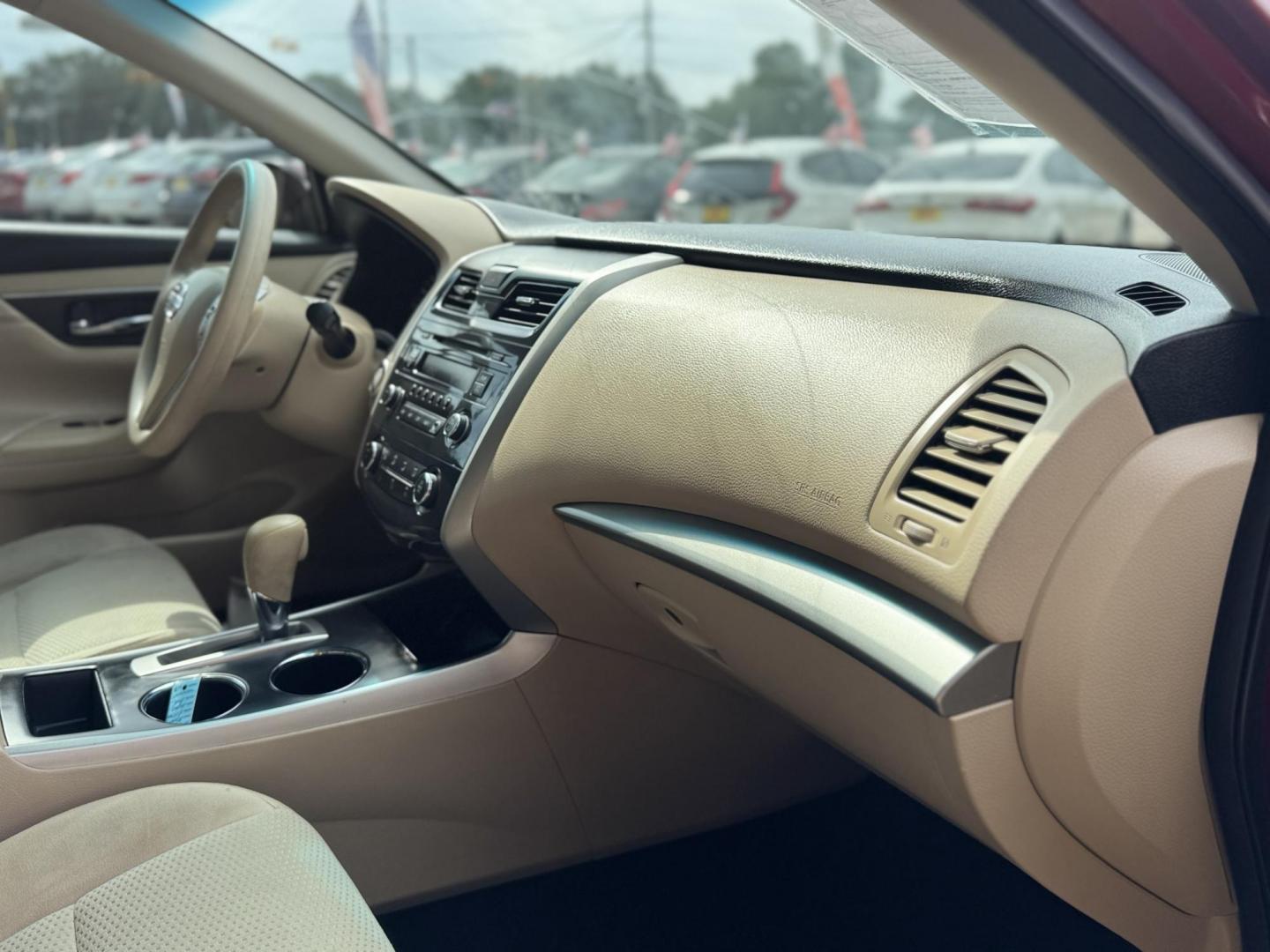 2015 Red /Tan Nissan Altima 2.5 S (1N4AL3AP4FN) with an 2.5L L4 DOHC 16V engine, Continuously Variable Transmission transmission, located at 16710 Clay Rd., Houston, TX, 77084, (281) 859-7900, 29.834864, -95.656166 - Photo#7