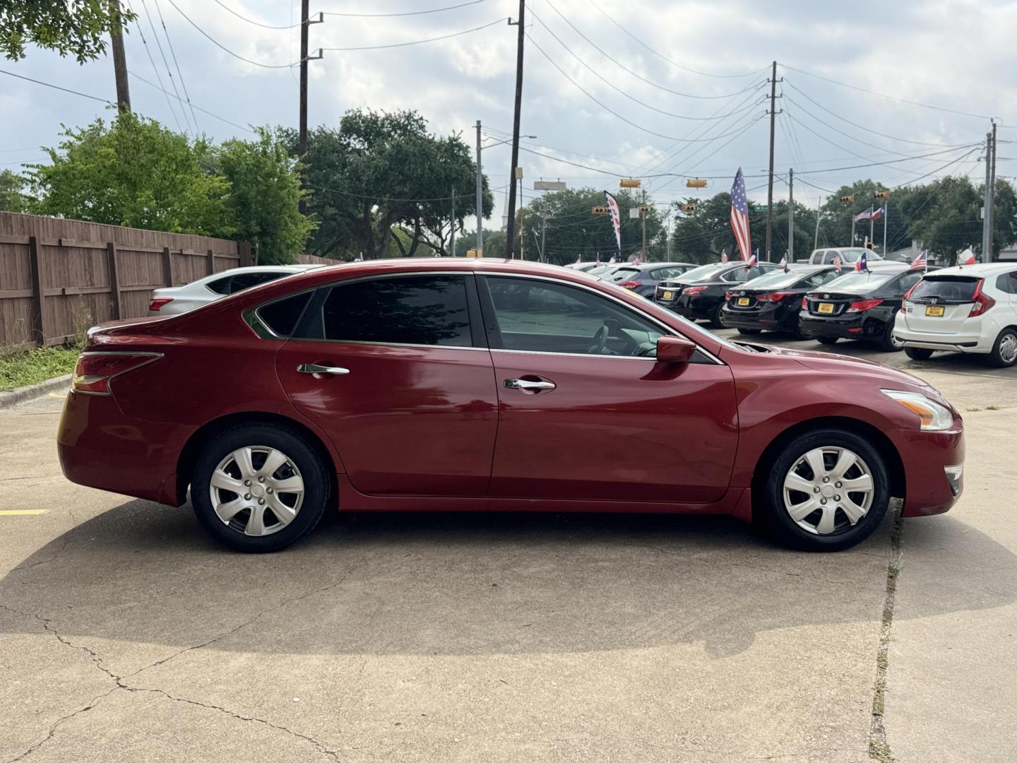 2015 Red /Tan Nissan Altima 2.5 S (1N4AL3AP4FN) with an 2.5L L4 DOHC 16V engine, Continuously Variable Transmission transmission, located at 16710 Clay Rd., Houston, TX, 77084, (281) 859-7900, 29.834864, -95.656166 - Photo#9