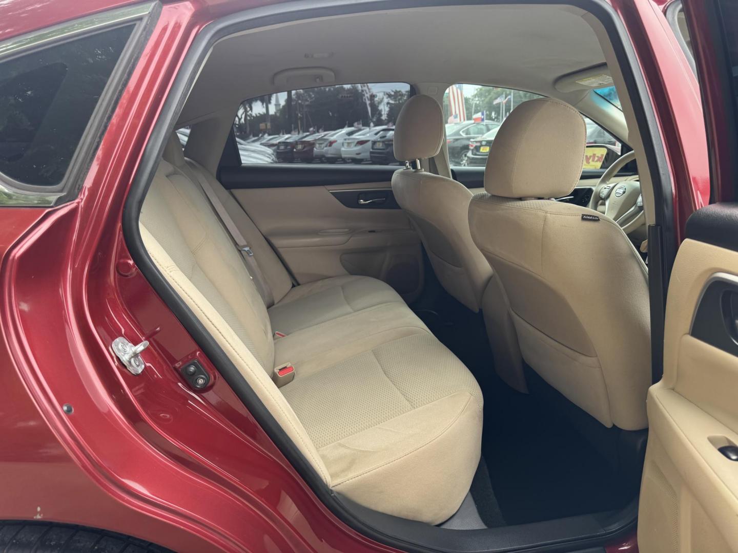 2015 Red /Tan Nissan Altima 2.5 S (1N4AL3AP4FN) with an 2.5L L4 DOHC 16V engine, Continuously Variable Transmission transmission, located at 16710 Clay Rd., Houston, TX, 77084, (281) 859-7900, 29.834864, -95.656166 - Photo#11