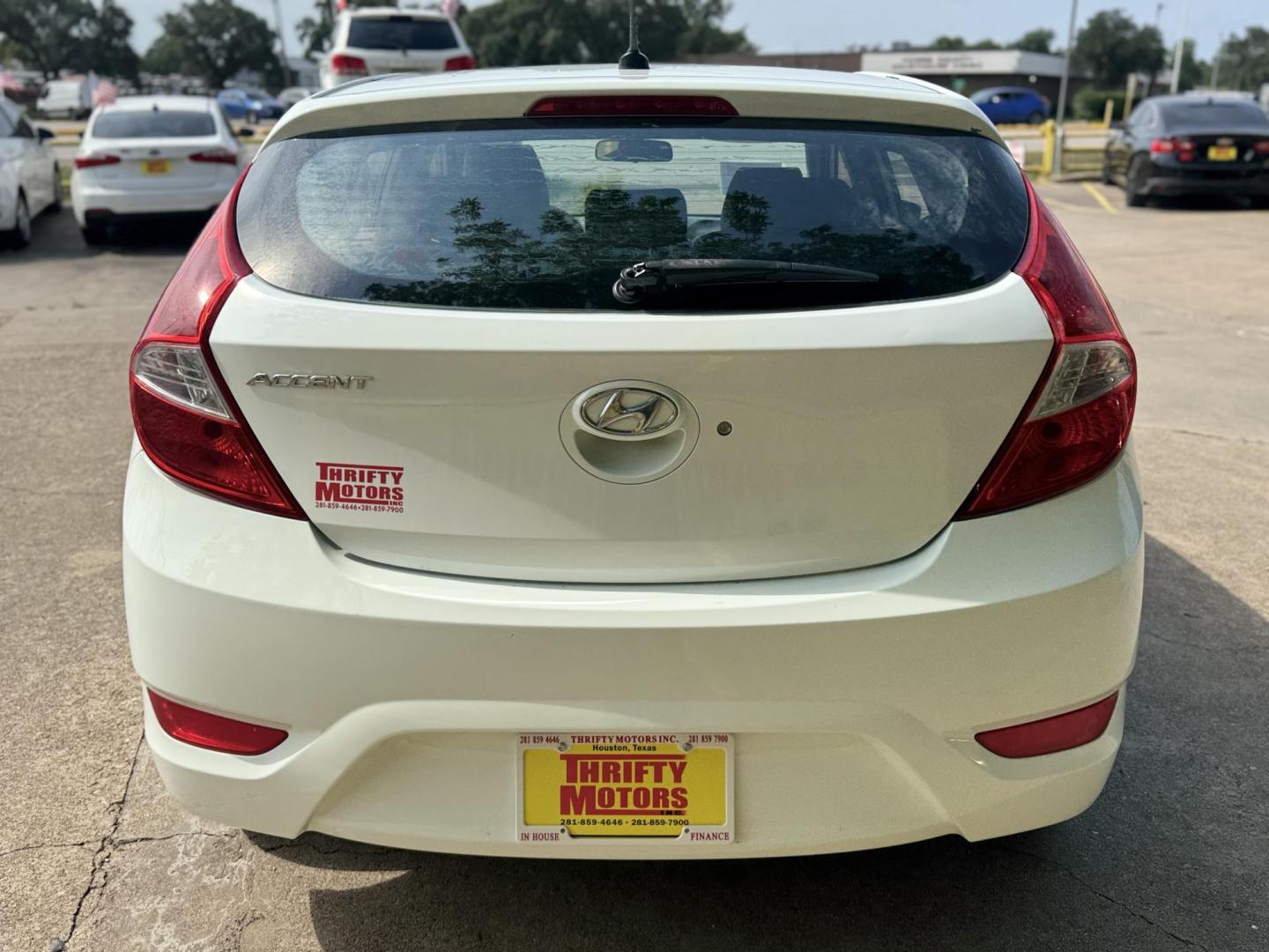 2014 White /Silver Hyundai Accent GS 5-Door (KMHCT5AE4EU) with an 1.6L L4 DOHC 16V engine, located at 16710 Clay Rd., Houston, TX, 77084, (281) 859-7900, 29.834864, -95.656166 - Photo#5