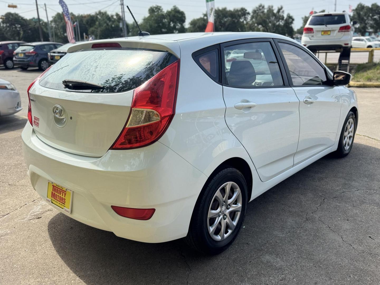 2014 White /Silver Hyundai Accent GS 5-Door (KMHCT5AE4EU) with an 1.6L L4 DOHC 16V engine, located at 16710 Clay Rd., Houston, TX, 77084, (281) 859-7900, 29.834864, -95.656166 - Photo#6