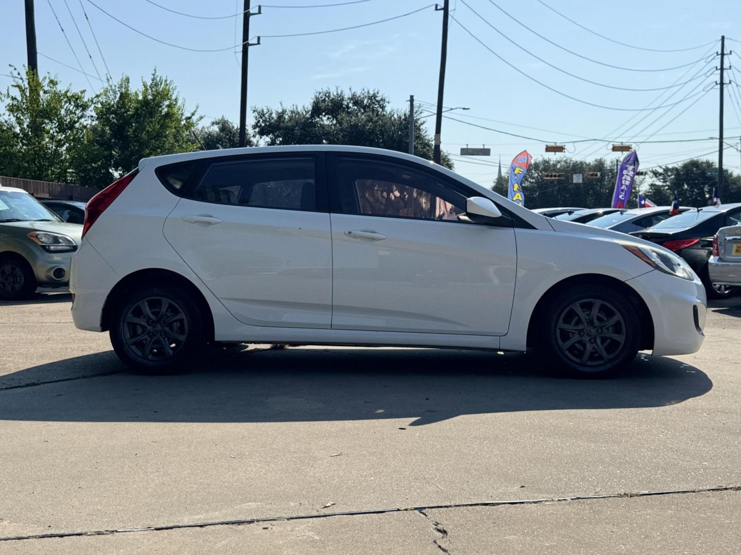 2014 White /Silver Hyundai Accent GS 5-Door (KMHCT5AE4EU) with an 1.6L L4 DOHC 16V engine, located at 16710 Clay Rd., Houston, TX, 77084, (281) 859-7900, 29.834864, -95.656166 - Photo#36