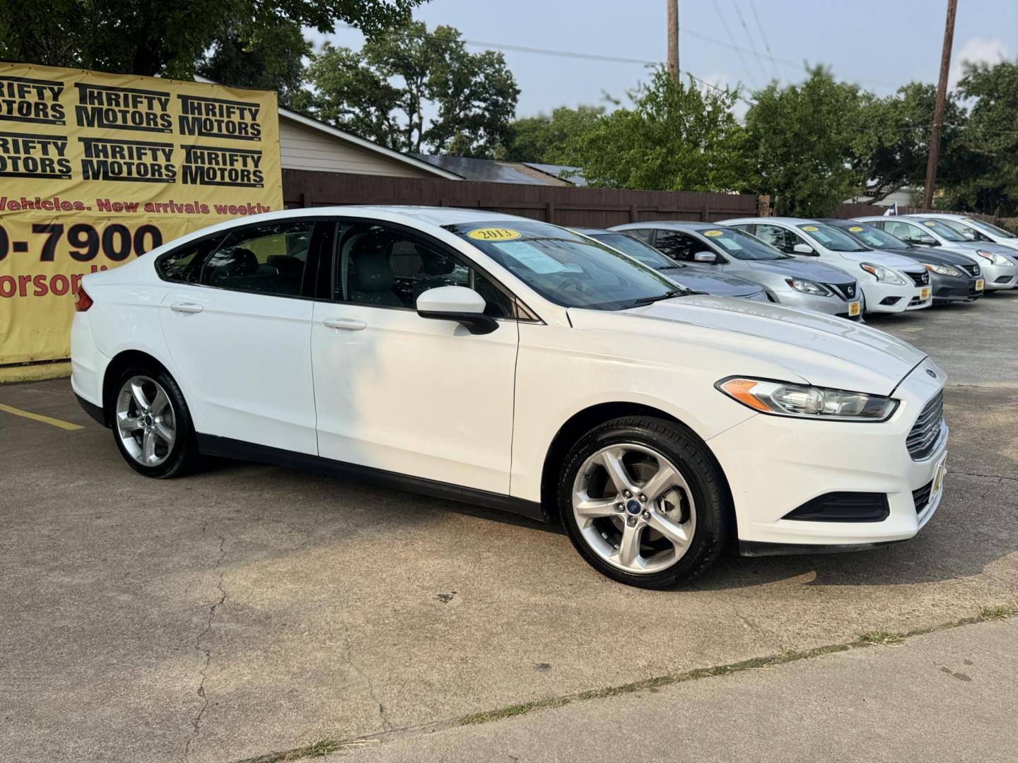 2013 White /Silver Ford Fusion S (3FA6P0G74DR) with an 2.5L L4 DOHC 16V engine, located at 16710 Clay Rd., Houston, TX, 77084, (281) 859-7900, 29.834864, -95.656166 - Photo#2