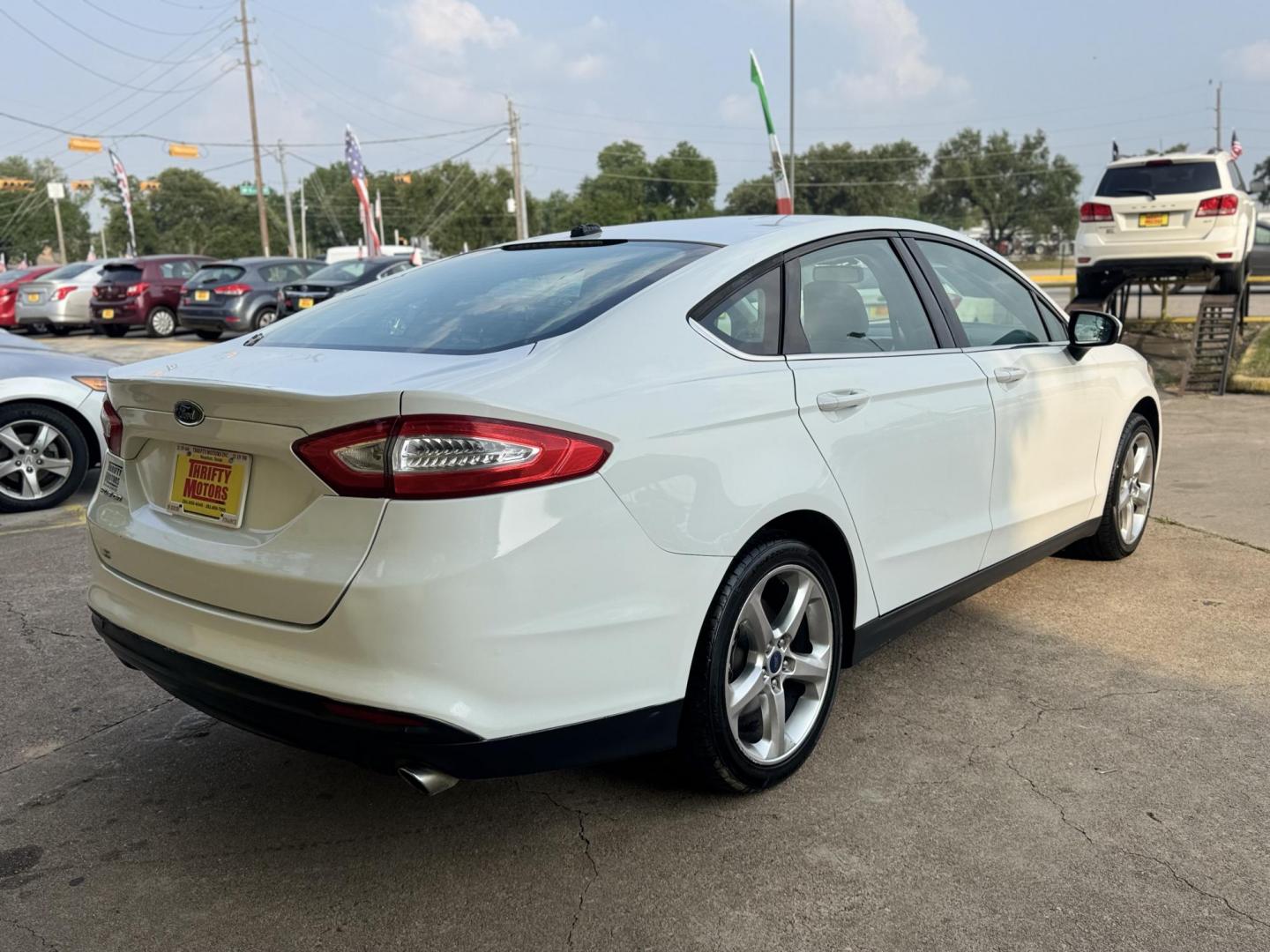 2013 White /Silver Ford Fusion S (3FA6P0G74DR) with an 2.5L L4 DOHC 16V engine, located at 16710 Clay Rd., Houston, TX, 77084, (281) 859-7900, 29.834864, -95.656166 - Photo#5