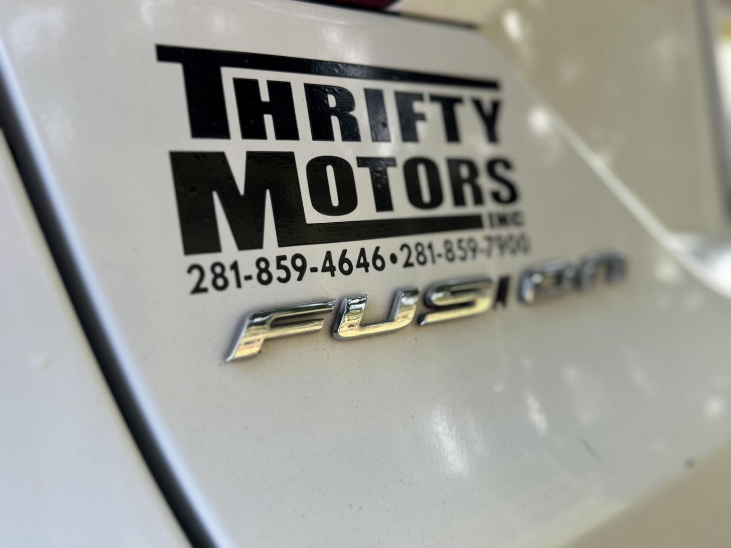 2013 White /Silver Ford Fusion S (3FA6P0G74DR) with an 2.5L L4 DOHC 16V engine, located at 16710 Clay Rd., Houston, TX, 77084, (281) 859-7900, 29.834864, -95.656166 - Photo#7