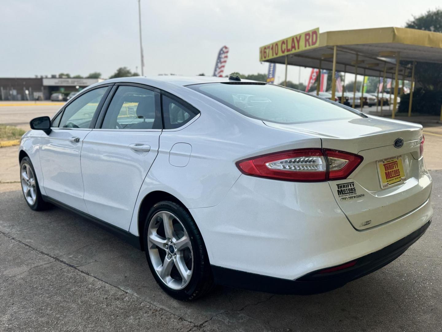 2013 White /Silver Ford Fusion S (3FA6P0G74DR) with an 2.5L L4 DOHC 16V engine, located at 16710 Clay Rd., Houston, TX, 77084, (281) 859-7900, 29.834864, -95.656166 - Photo#8