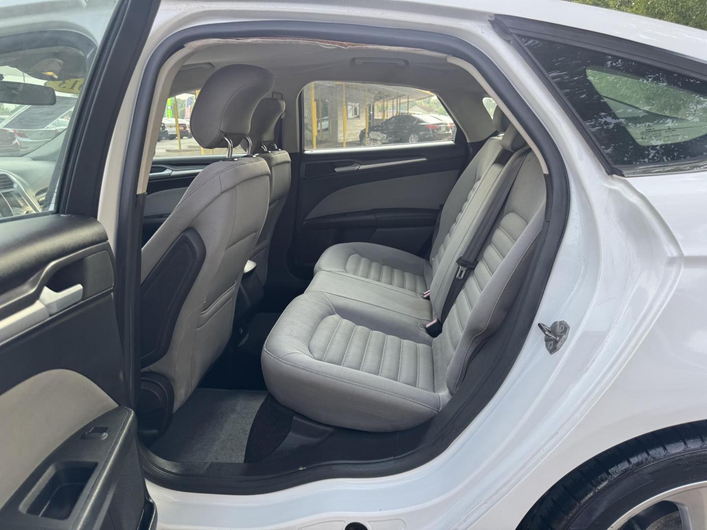 2013 White /Silver Ford Fusion S (3FA6P0G74DR) with an 2.5L L4 DOHC 16V engine, located at 16710 Clay Rd., Houston, TX, 77084, (281) 859-7900, 29.834864, -95.656166 - Photo#9