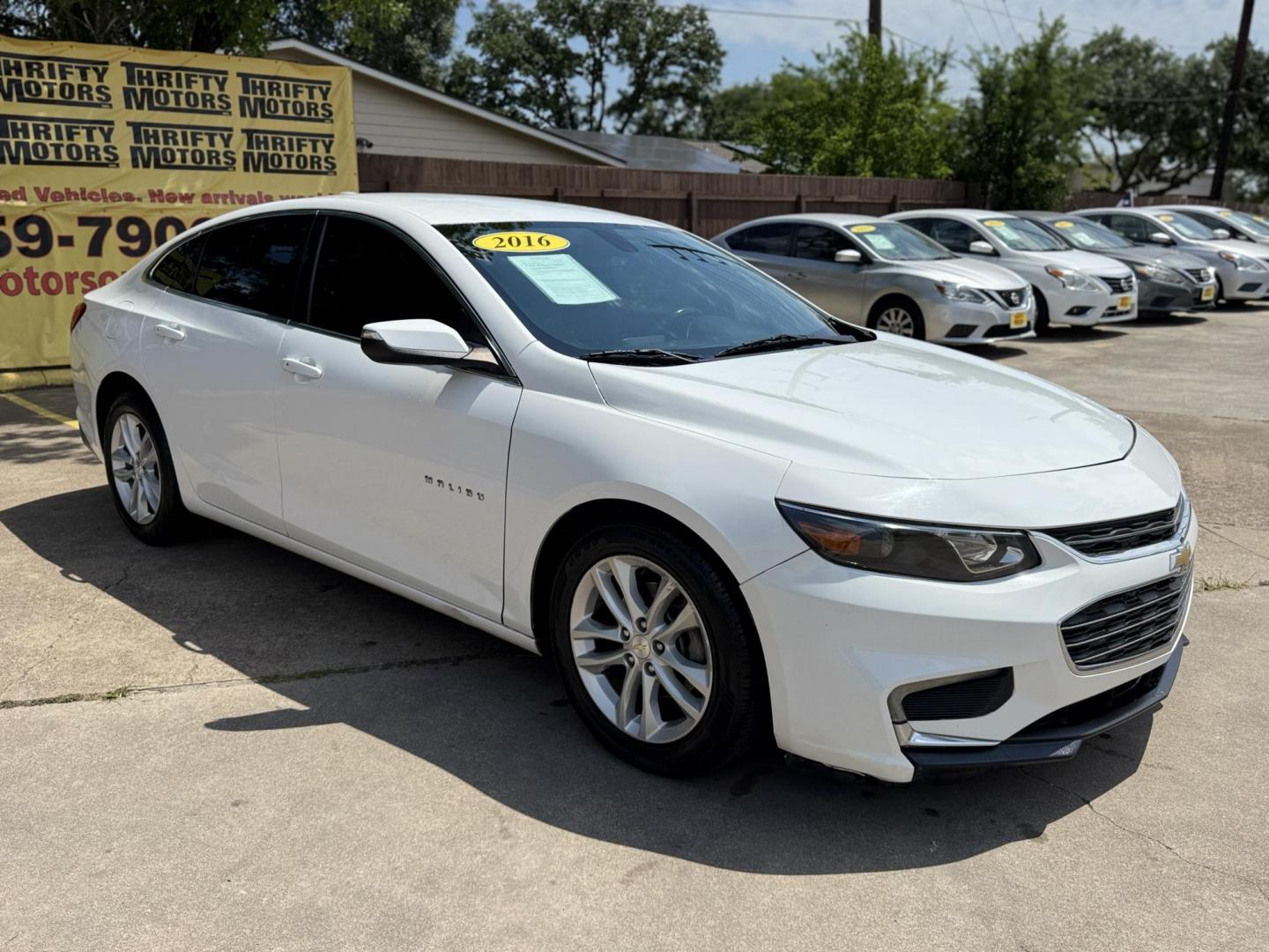 2016 White /Gray Chevrolet Malibu 1LT (1G1ZE5ST7GF) with an 1.5L L4 DOHC 16V engine, 6A transmission, located at 16710 Clay Rd., Houston, TX, 77084, (281) 859-7900, 29.834864, -95.656166 - Photo#2