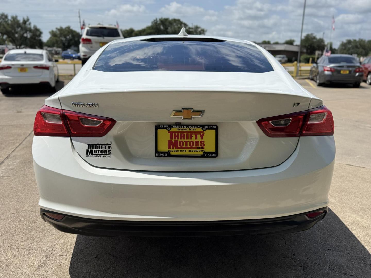 2016 White /Gray Chevrolet Malibu 1LT (1G1ZE5ST7GF) with an 1.5L L4 DOHC 16V engine, 6A transmission, located at 16710 Clay Rd., Houston, TX, 77084, (281) 859-7900, 29.834864, -95.656166 - Photo#4