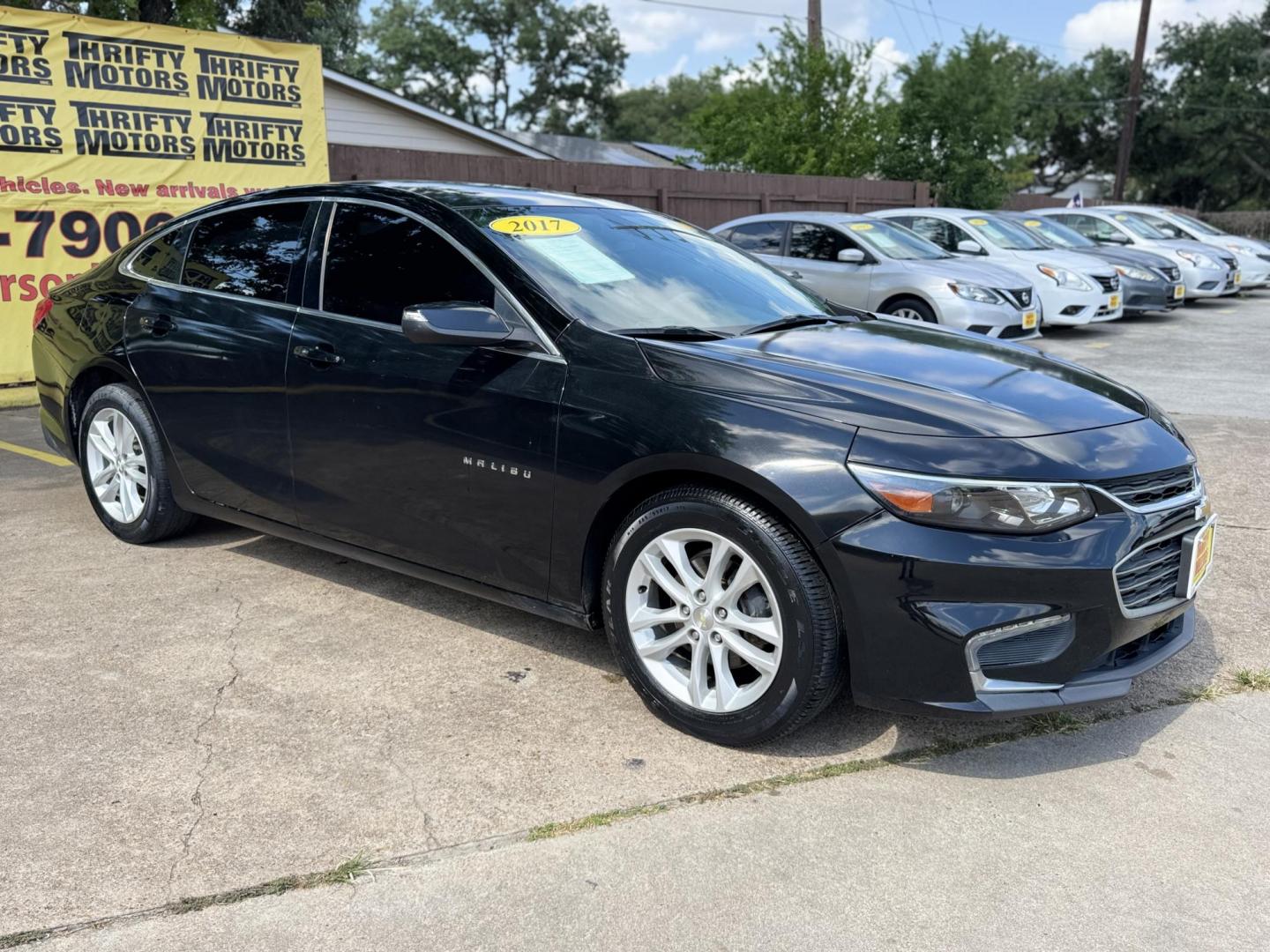 2017 Black /Black Chevrolet Malibu 1LT (1G1ZE5ST9HF) with an 1.5L L4 DOHC 16V engine, 6A transmission, located at 16710 Clay Rd., Houston, TX, 77084, (281) 859-7900, 29.834864, -95.656166 - Photo#2