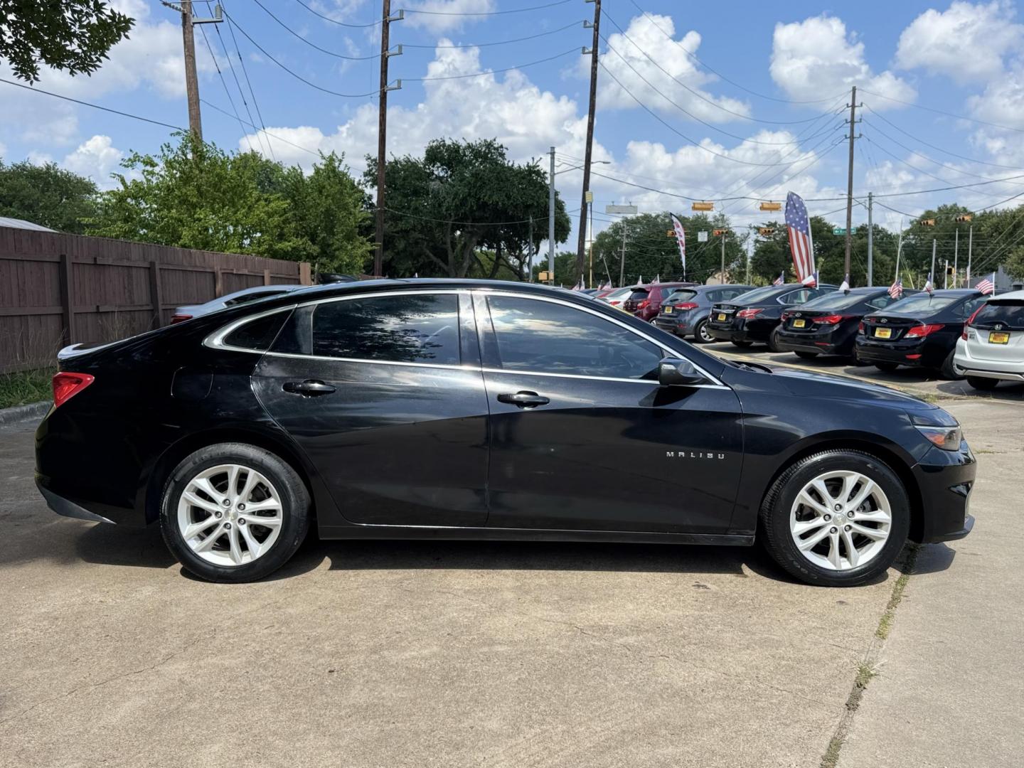 2017 Black /Black Chevrolet Malibu 1LT (1G1ZE5ST9HF) with an 1.5L L4 DOHC 16V engine, 6A transmission, located at 16710 Clay Rd., Houston, TX, 77084, (281) 859-7900, 29.834864, -95.656166 - Photo#4