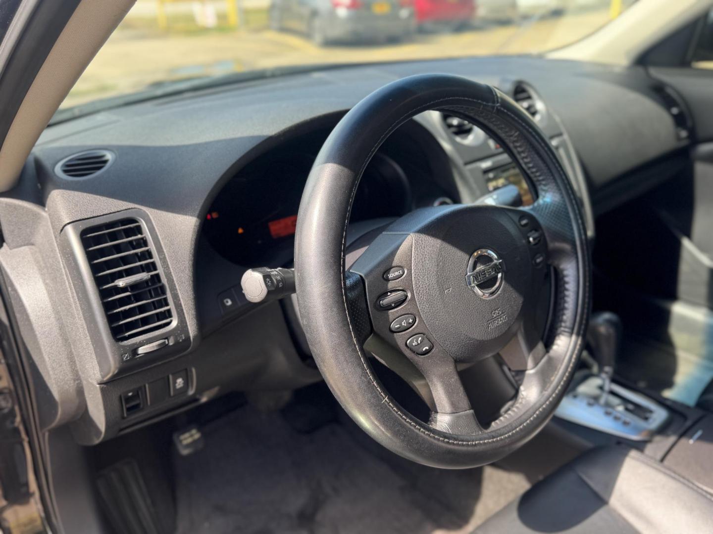 2012 Black /Black Nissan Altima 3.5 SR (1N4BL2AP5CN) with an 3.5L V6 DOHC 24V engine, Continuously Variable Transmission transmission, located at 16710 Clay Rd., Houston, TX, 77084, (281) 859-7900, 29.834864, -95.656166 - Photo#7