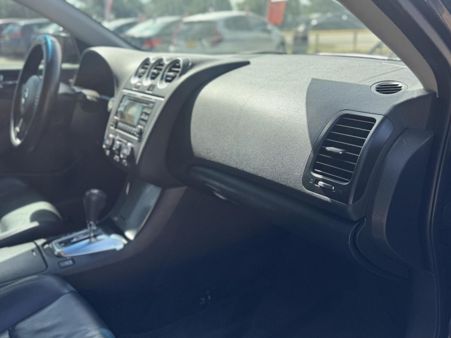2012 Black /Black Nissan Altima 3.5 SR (1N4BL2AP5CN) with an 3.5L V6 DOHC 24V engine, Continuously Variable Transmission transmission, located at 16710 Clay Rd., Houston, TX, 77084, (281) 859-7900, 29.834864, -95.656166 - Photo#14