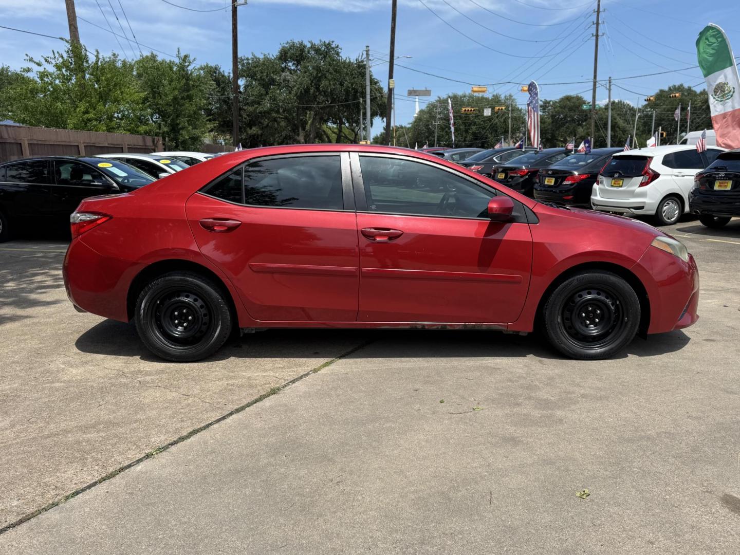 2016 Red /Silver Toyota Corolla L 4-Speed AT (2T1BURHE0GC) with an 1.8L L4 DOHC 16V engine, 4A transmission, located at 16710 Clay Rd., Houston, TX, 77084, (281) 859-7900, 29.834864, -95.656166 - Photo#3