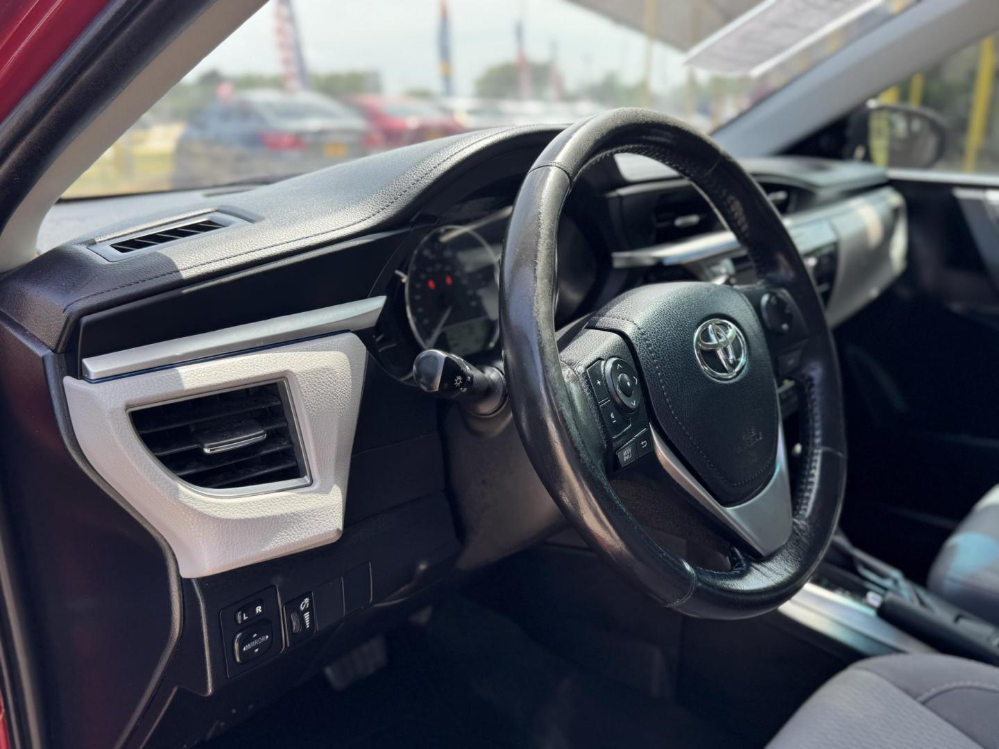 2016 Red /Silver Toyota Corolla L 4-Speed AT (2T1BURHE0GC) with an 1.8L L4 DOHC 16V engine, 4A transmission, located at 16710 Clay Rd., Houston, TX, 77084, (281) 859-7900, 29.834864, -95.656166 - Photo#9