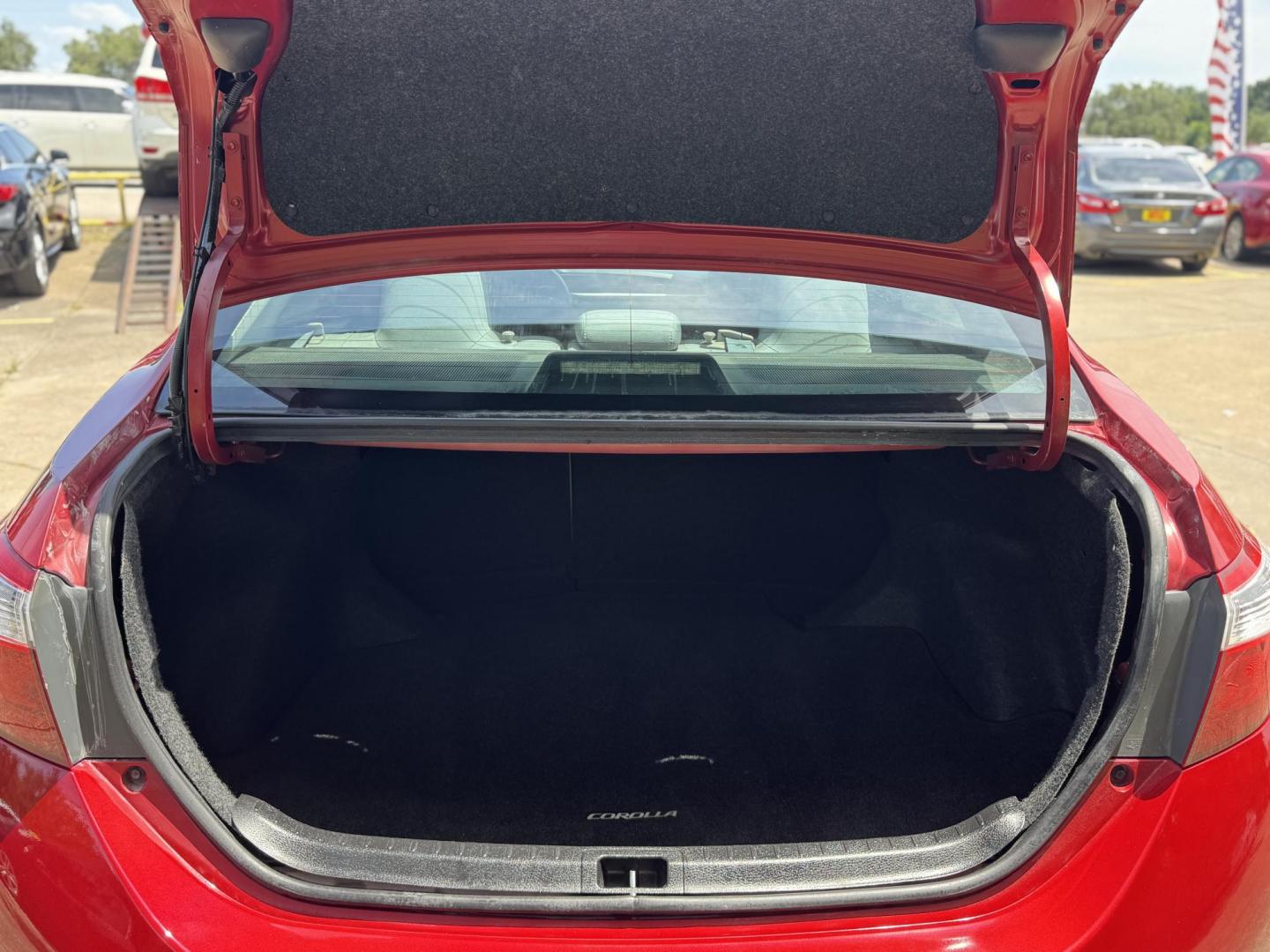 2016 Red /Silver Toyota Corolla L 4-Speed AT (2T1BURHE0GC) with an 1.8L L4 DOHC 16V engine, 4A transmission, located at 16710 Clay Rd., Houston, TX, 77084, (281) 859-7900, 29.834864, -95.656166 - Photo#12