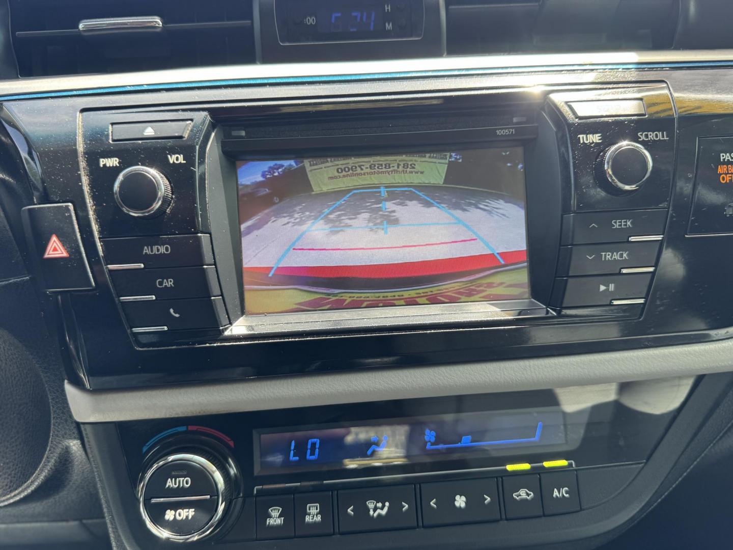 2016 Red /Silver Toyota Corolla L 4-Speed AT (2T1BURHE0GC) with an 1.8L L4 DOHC 16V engine, 4A transmission, located at 16710 Clay Rd., Houston, TX, 77084, (281) 859-7900, 29.834864, -95.656166 - Photo#18