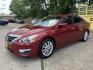 2015 Red /Gray Nissan Altima 2.5 S (1N4AL3AP8FN) with an 2.5L L4 DOHC 16V engine, Continuously Variable Transmission transmission, located at 16710 Clay Rd., Houston, TX, 77084, (281) 859-7900, 29.834864, -95.656166 - Photo#1