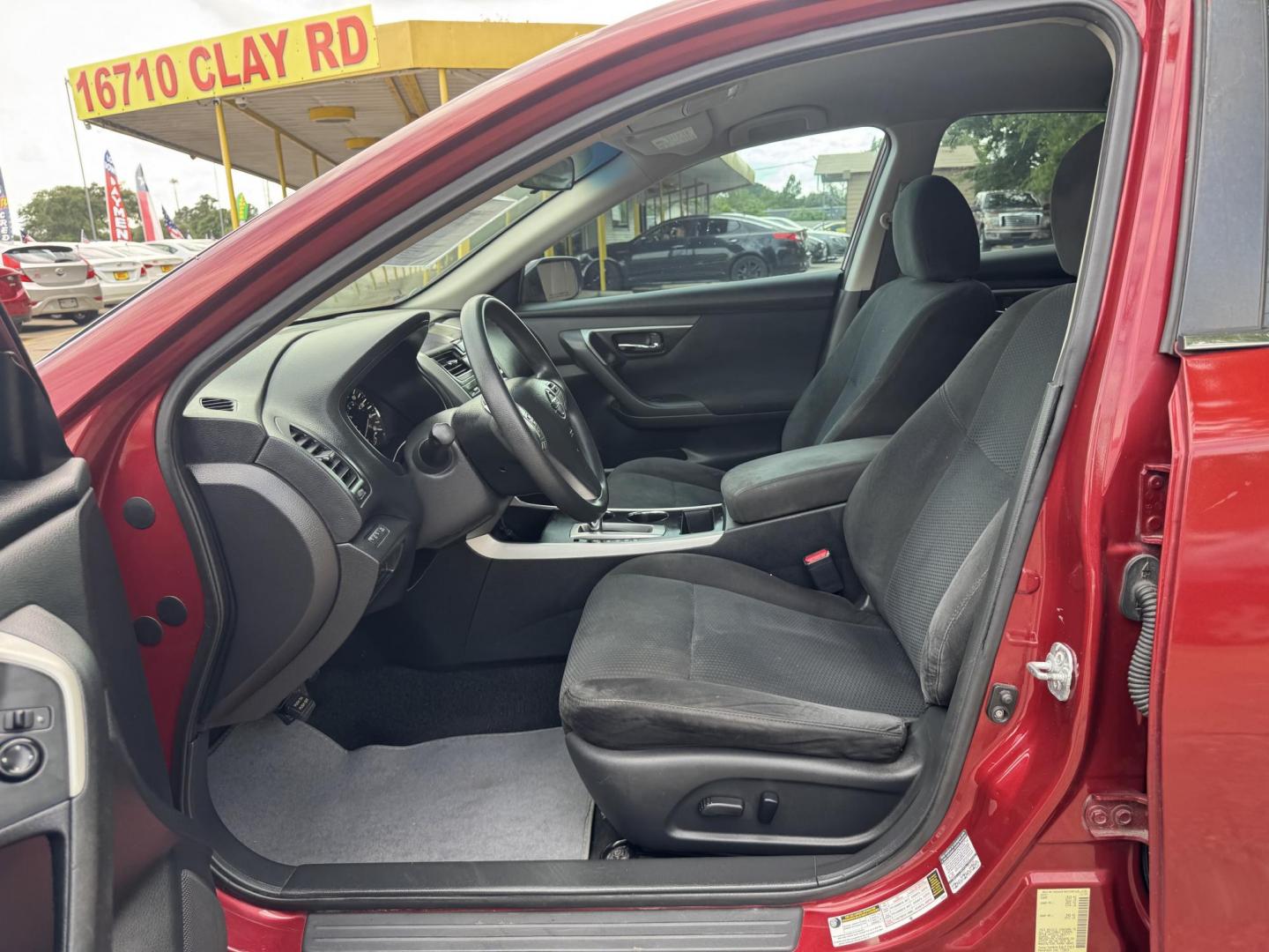 2015 Red /Gray Nissan Altima 2.5 S (1N4AL3AP8FN) with an 2.5L L4 DOHC 16V engine, Continuously Variable Transmission transmission, located at 16710 Clay Rd., Houston, TX, 77084, (281) 859-7900, 29.834864, -95.656166 - Photo#9