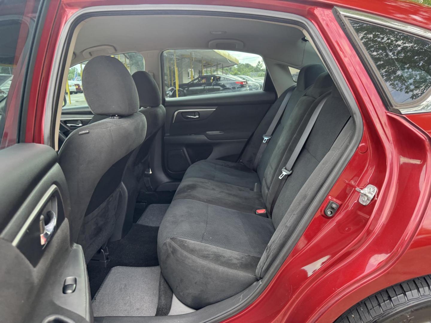 2015 Red /Gray Nissan Altima 2.5 S (1N4AL3AP8FN) with an 2.5L L4 DOHC 16V engine, Continuously Variable Transmission transmission, located at 16710 Clay Rd., Houston, TX, 77084, (281) 859-7900, 29.834864, -95.656166 - Photo#10
