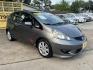 2011 Gray /Black Honda Fit Sport 5-Speed AT (JHMGE8H52BC) with an 1.5L L4 SOHC 16V engine, 5-Speed Automatic transmission, located at 16710 Clay Rd., Houston, TX, 77084, (281) 859-7900, 29.834864, -95.656166 - Photo#2
