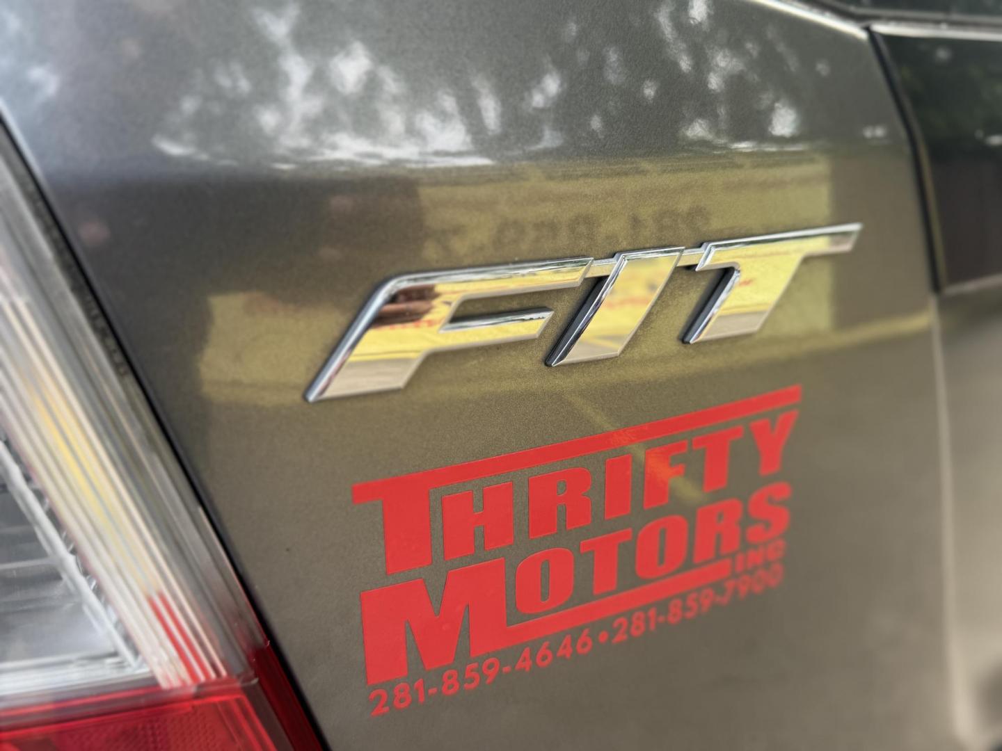 2011 Gray /Black Honda Fit Sport 5-Speed AT (JHMGE8H52BC) with an 1.5L L4 SOHC 16V engine, 5-Speed Automatic transmission, located at 16710 Clay Rd., Houston, TX, 77084, (281) 859-7900, 29.834864, -95.656166 - Photo#5
