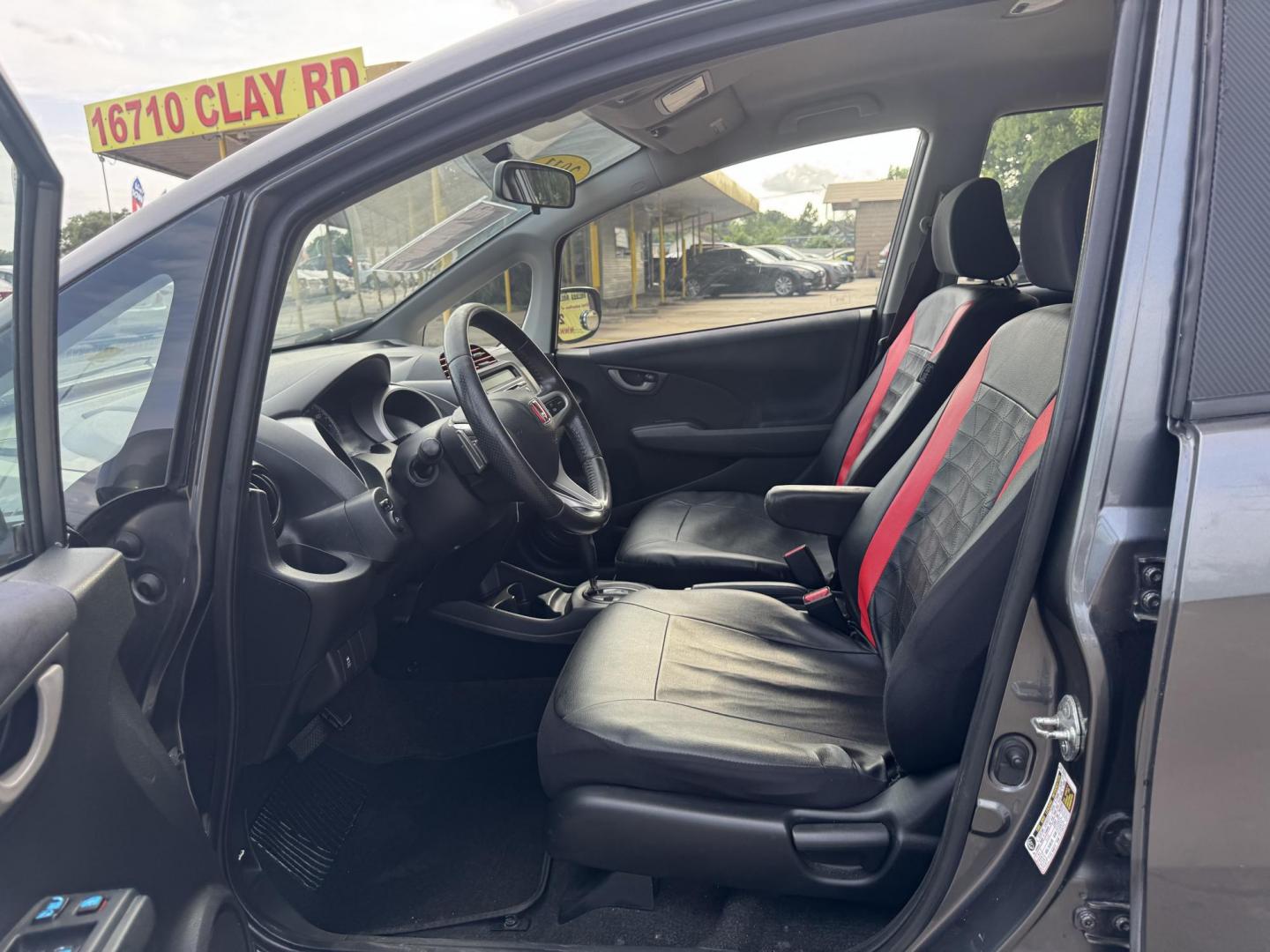 2011 Gray /Black Honda Fit Sport 5-Speed AT (JHMGE8H52BC) with an 1.5L L4 SOHC 16V engine, 5-Speed Automatic transmission, located at 16710 Clay Rd., Houston, TX, 77084, (281) 859-7900, 29.834864, -95.656166 - Photo#8