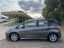 2011 Gray /Black Honda Fit Sport 5-Speed AT (JHMGE8H52BC) with an 1.5L L4 SOHC 16V engine, 5-Speed Automatic transmission, located at 16710 Clay Rd., Houston, TX, 77084, (281) 859-7900, 29.834864, -95.656166 - Photo#10