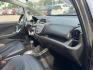 2011 Gray /Black Honda Fit Sport 5-Speed AT (JHMGE8H52BC) with an 1.5L L4 SOHC 16V engine, 5-Speed Automatic transmission, located at 16710 Clay Rd., Houston, TX, 77084, (281) 859-7900, 29.834864, -95.656166 - Photo#16