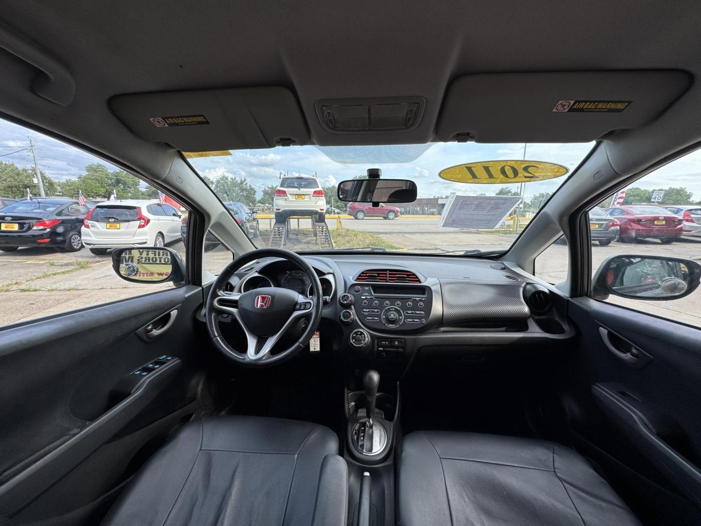 2011 Gray /Black Honda Fit Sport 5-Speed AT (JHMGE8H52BC) with an 1.5L L4 SOHC 16V engine, 5-Speed Automatic transmission, located at 16710 Clay Rd., Houston, TX, 77084, (281) 859-7900, 29.834864, -95.656166 - Photo#18